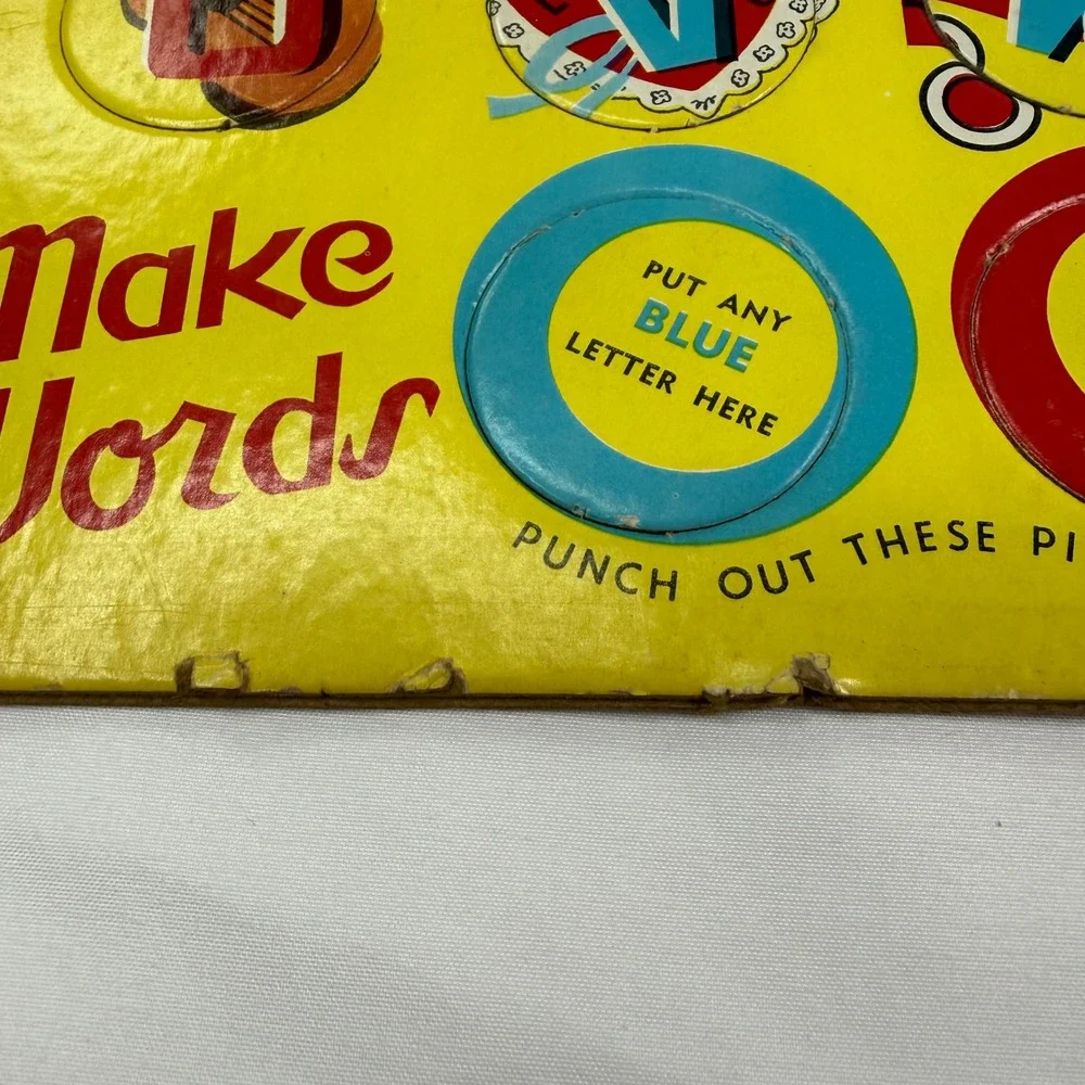 Vintage Built-Rite Make Words Alphabet Board Yellow Cardboard Punch Out Toy USA